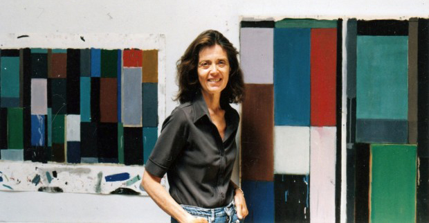 Pat Lipsky standing next to painting "Builder" in Chelsea studio in 2000.