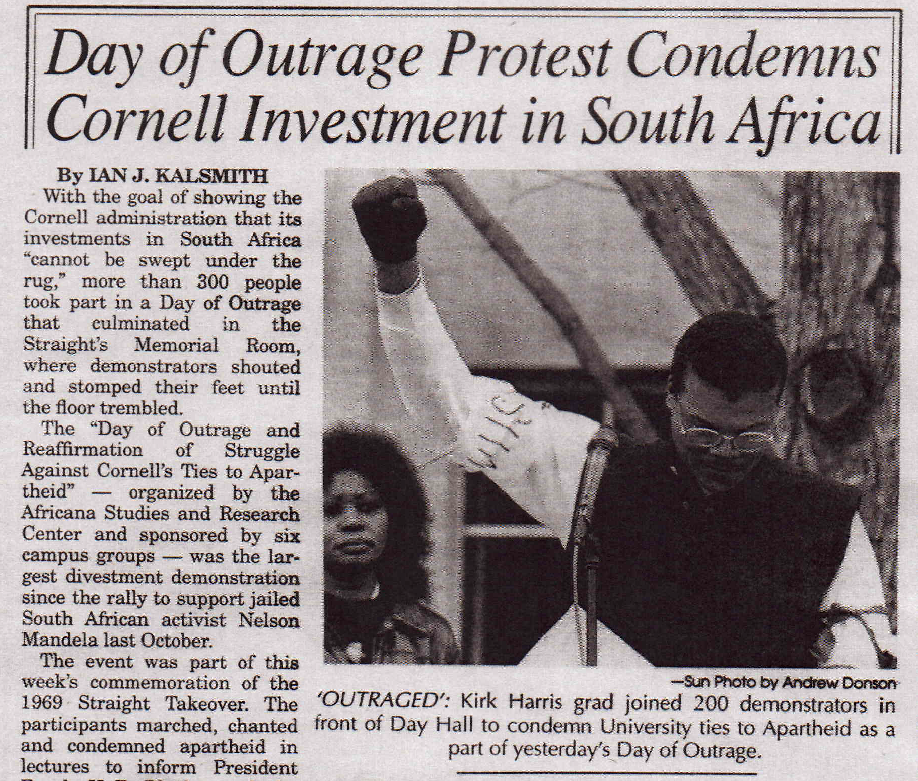 Newspaper clipping shows Kirk Harris at a protest in 1989.