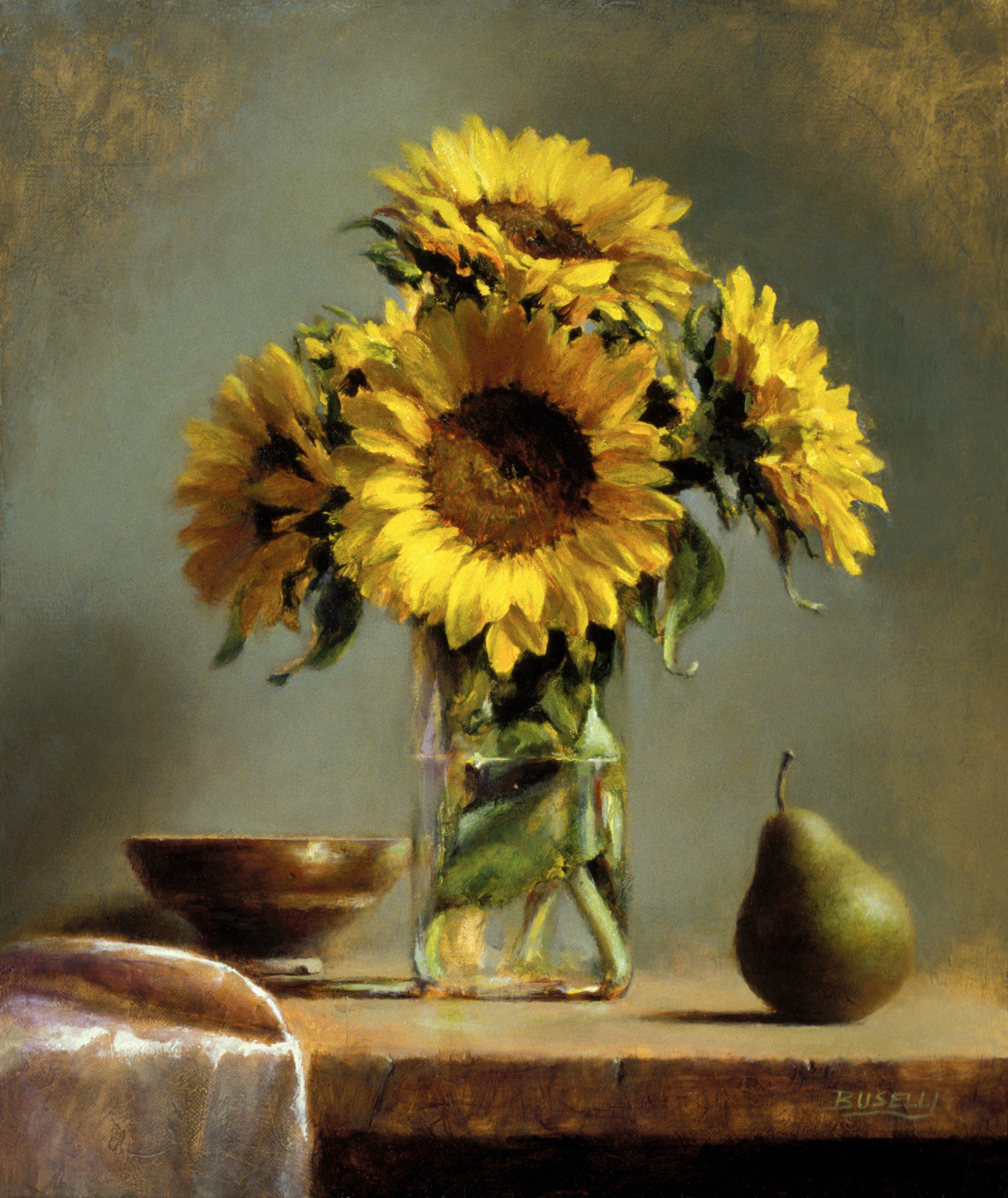 Oil on linen painting of sunflowers in a clear vase next to a pear on a wooden table.
