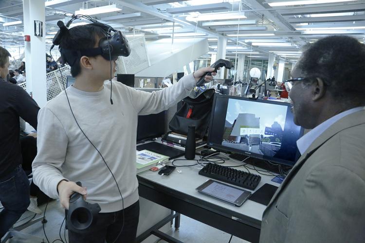 Male student wearing VR headset