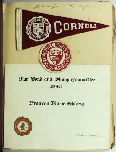 stamp committee certificate and Cornell flag in a scrapbook