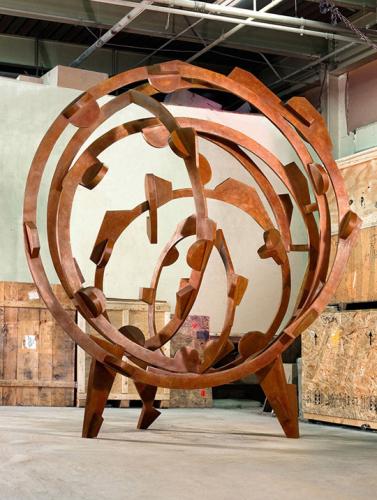 Rollin on the River: large circular bronze sculpture
