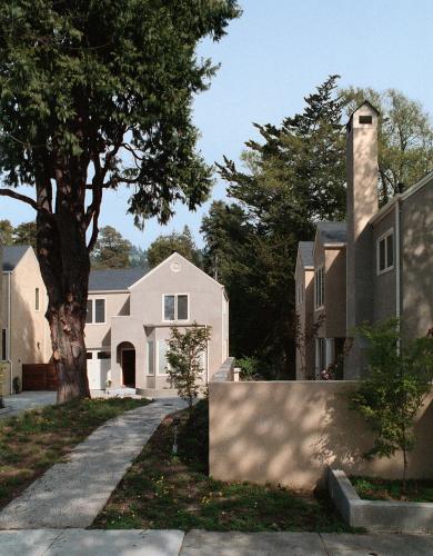 Facades of houses in a small complex.