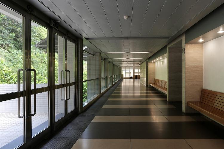 View of a long hallway and doors to outside