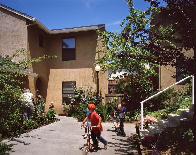 Kids play in the entry courtyard.