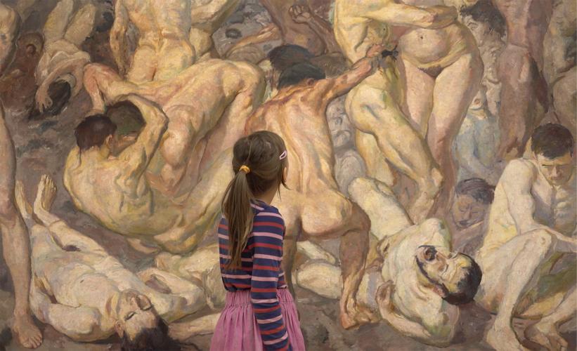 A young girl looks at a painting of nude adults in an art museum.