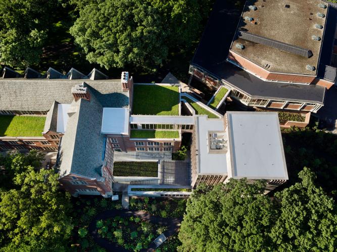 Aerial view of two buildings connected by a skybridge.