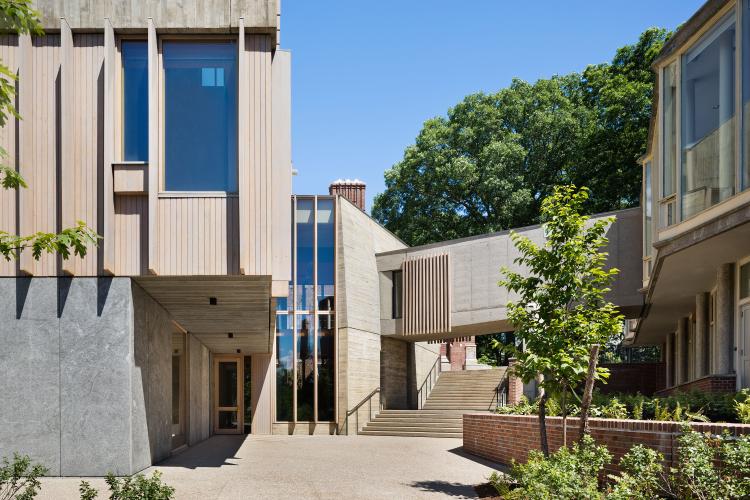 Planks accent a building's boxy exterior.