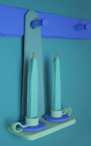 Turquoise artificial candles sit on a green shelf that hangs from a purple coat rack.