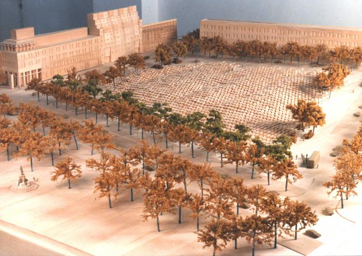 Model of the Berlin Memorial, depicting 2,711 concrete pillars bordered by trees.