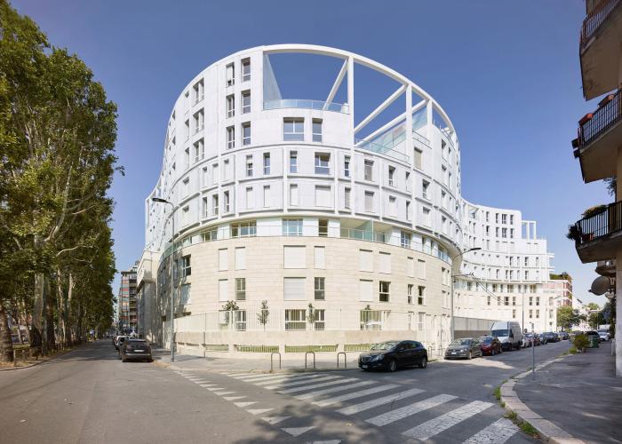 Exterior view of the curved side of a building