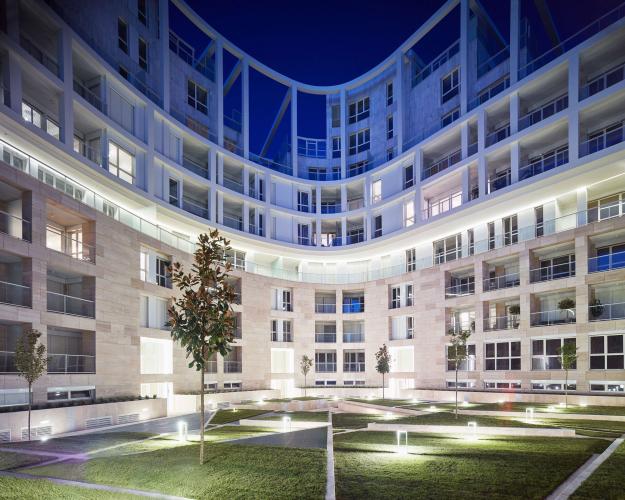 View of a building's courtyard at night.