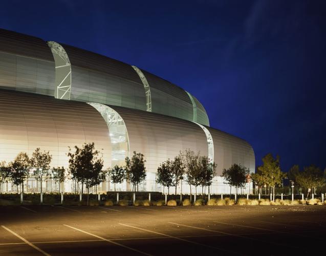 Exterior view of a spheroid-shaped stadium