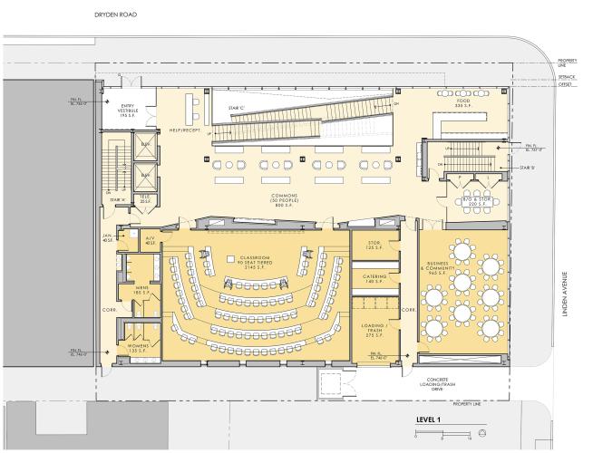 Yellow site plan for the first floor of a building with a classroom, meeting room, elevators, and stairs.
