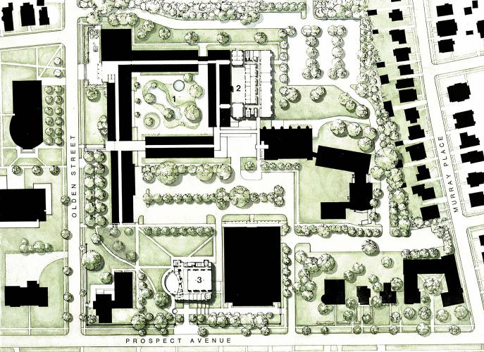 An aerial view site plan with black rectangles representing buildings, green shrubs, and green plots of grassy areas.